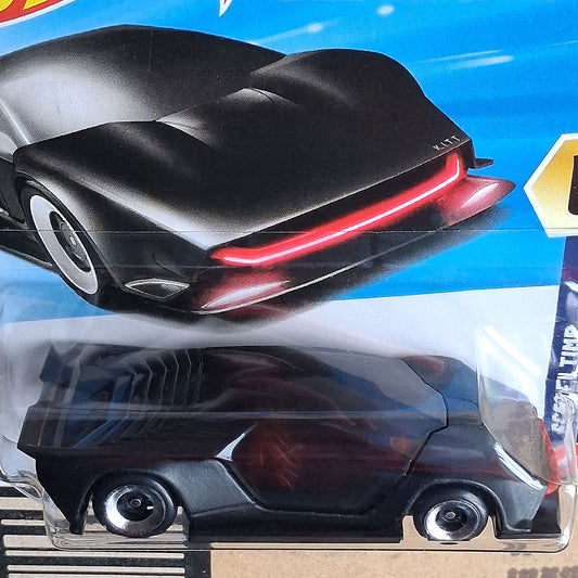 Close-up of Hot Wheels Knight Rider K.I.T.T. Concept 1/64 diecast showing signature red scanner light in sealed packaging