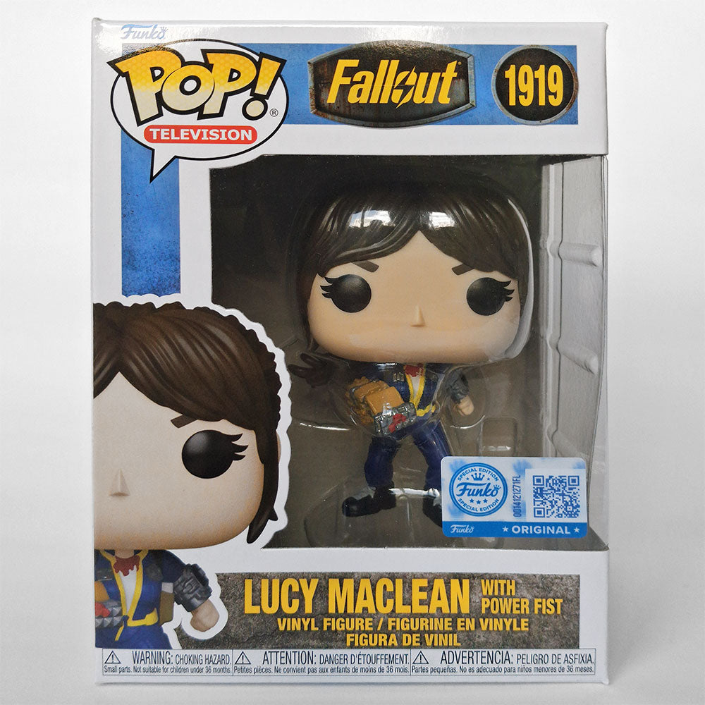 Funko Pop! Television 'Lucy Maclean' vinyl figure from Fallout 1919, in its original window box packaging. The figure features brown hair, a blue and yellow jacket, and a blue power fist accessory.