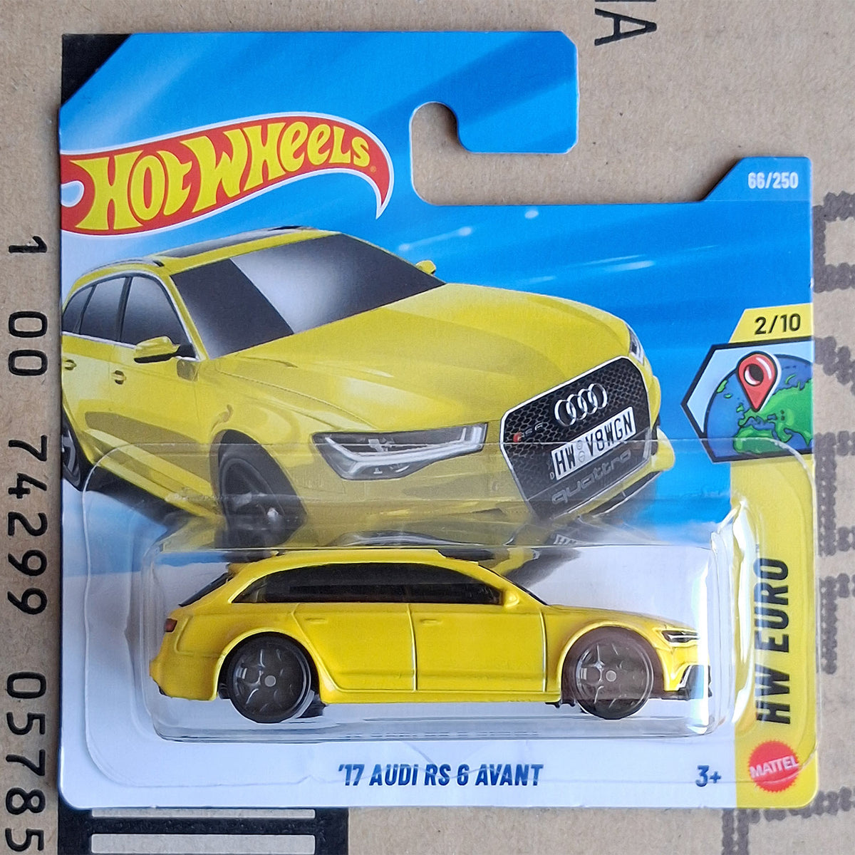 Hot Wheels Mattel '17 Audi RS 6 Avant die-cast toy car in its original blister packaging, featuring a bright yellow car on a blue and white card.