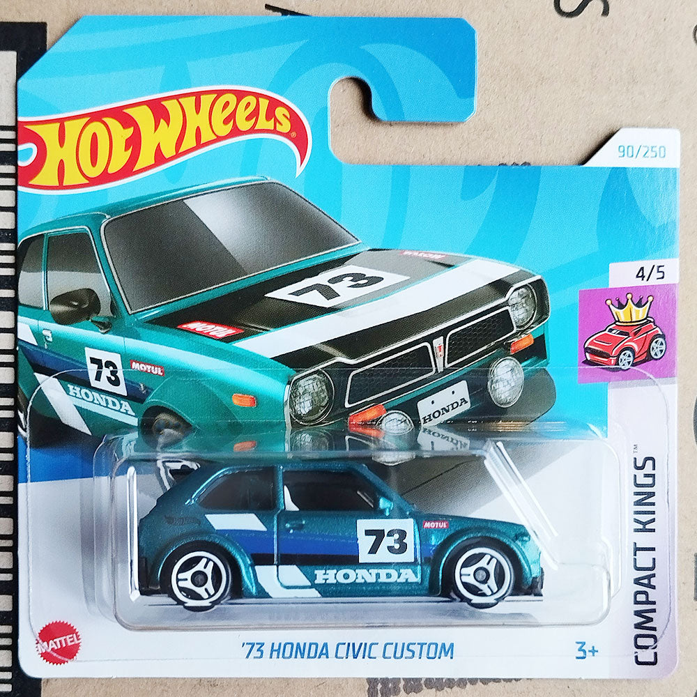 Hot Wheels '73 Honda Civic Custom toy car in packaging on a cardboard surface