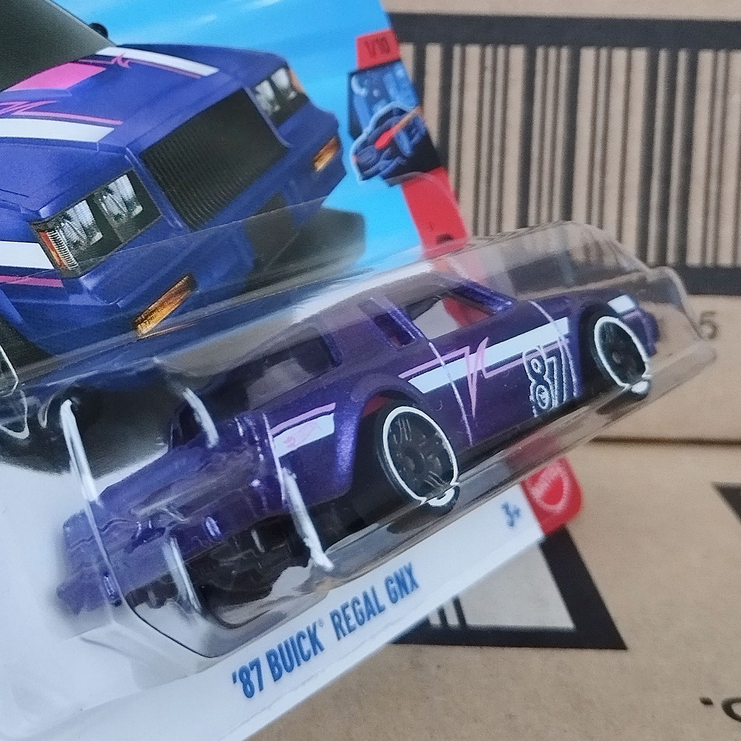 Detail view of Hot Wheels Treasure Hunt 1987 Buick Regal GNX 1/64 diecast muscle car in sealed blister packaging