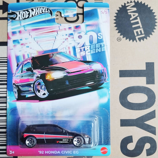 A Hot Wheels Mattel '92 Honda Civic EG toy car in its original blister card packaging, displayed on a cardboard box with a Mattel logo.