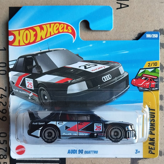 Hot Wheels Mattel 2013 Peak Pursuit Audi 90 Quattro die-cast toy car in its original blister card packaging, featuring a black, white, and red race car with the number 25.