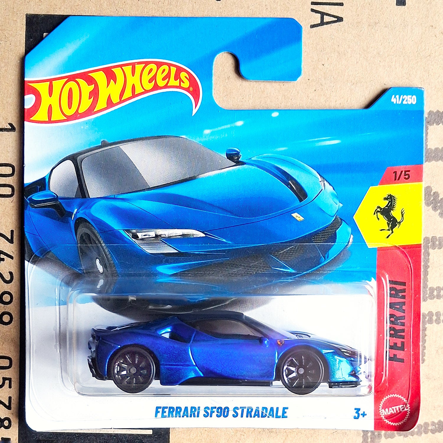 Hot Wheels Blue Ferrari SF90 Stradale 1/64 diecast model car in original blister packaging