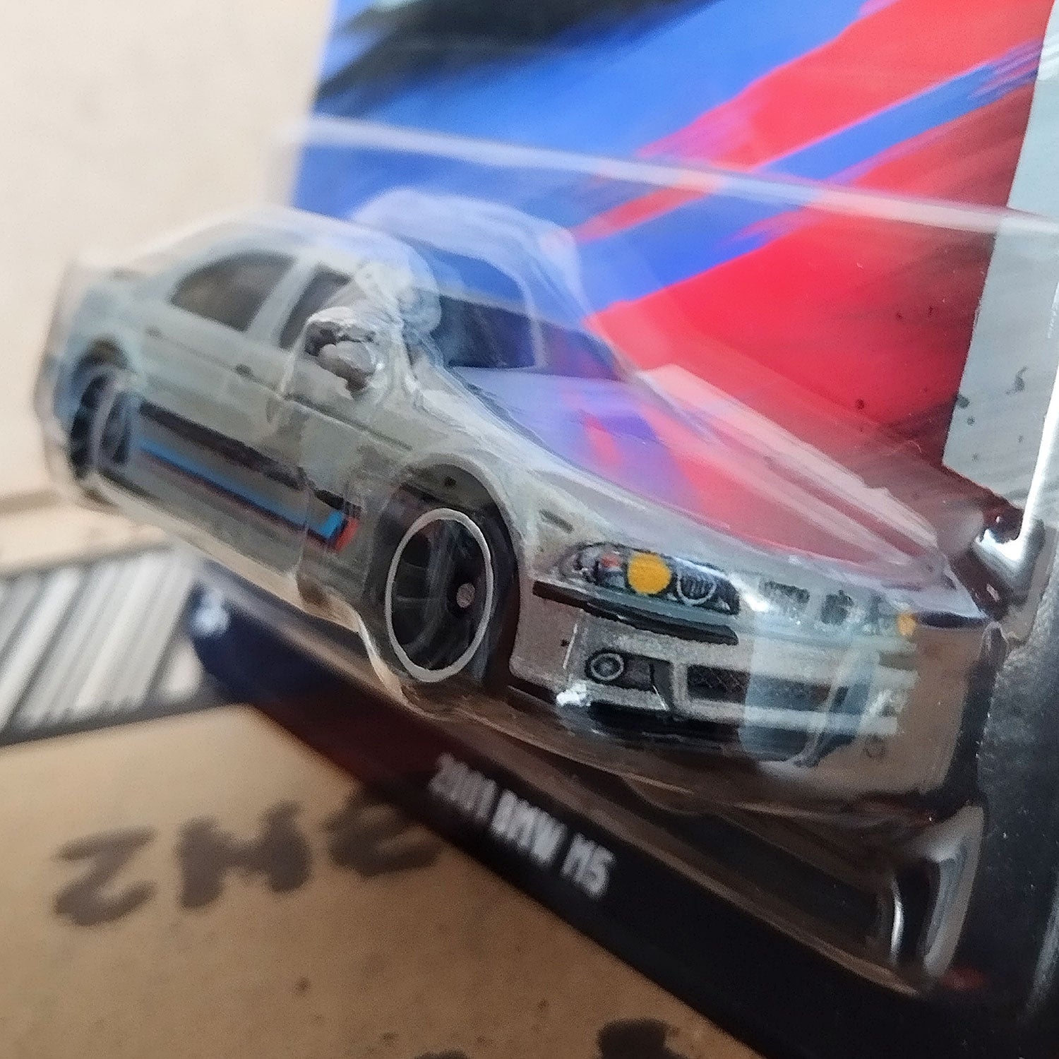 Hot Wheels BMW M5 2001 E39 diecast 1/64 model car in original packaging front side view