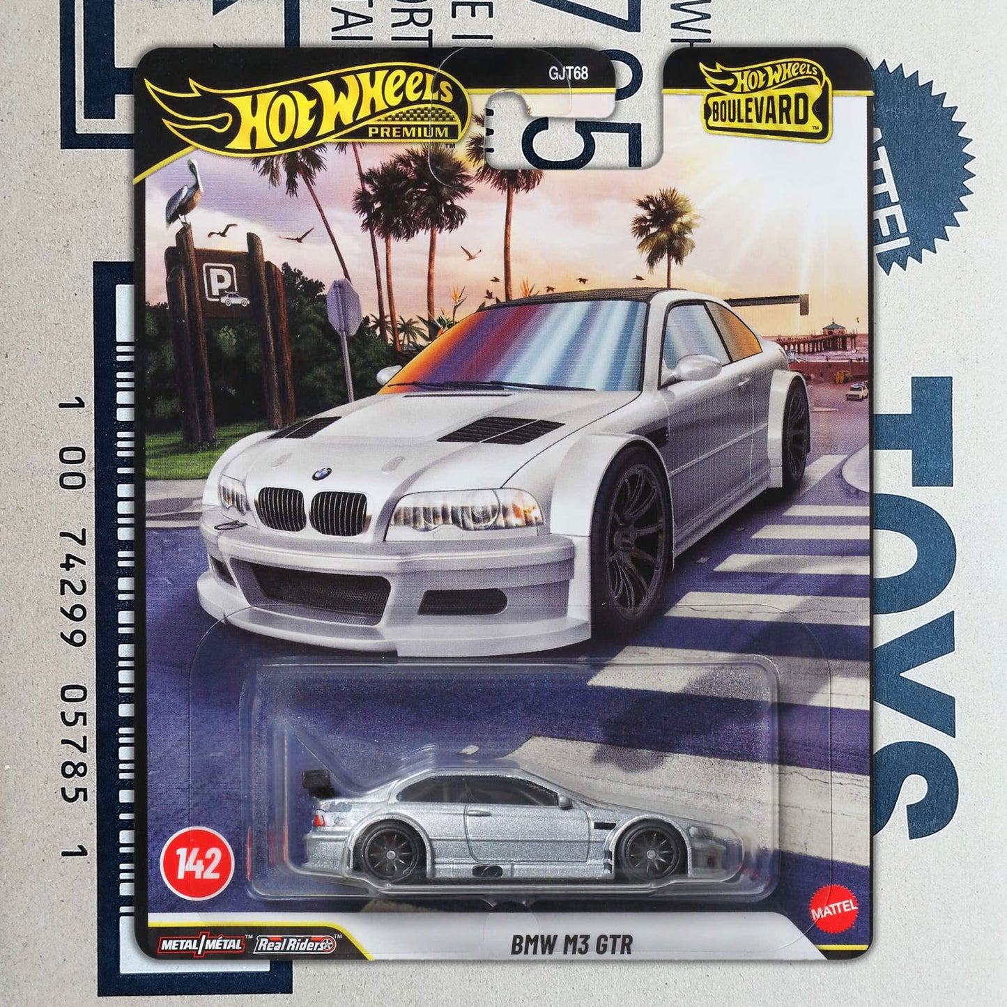 Hot Wheels BMW M3 GTR die-cast toy car in its original blister card packaging, featuring a silver car illustration and the Hot Wheels and Mattel logos.