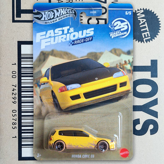 Hot Wheels Silver Series Fast & Furious 4 Race-Off 5/5 Honda Civic EG die-cast toy car in its original blister card packaging, featuring a yellow car with black flames on the front, set against a cardboard background with a barcode.