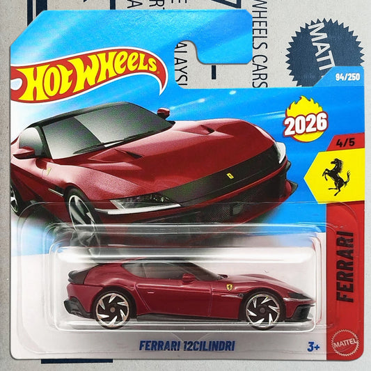 Hot Wheels Ferrari 12Cilindri die-cast toy car in its original blister packaging, featuring a red Ferrari sports car on a blue and white card with Hot Wheels branding.