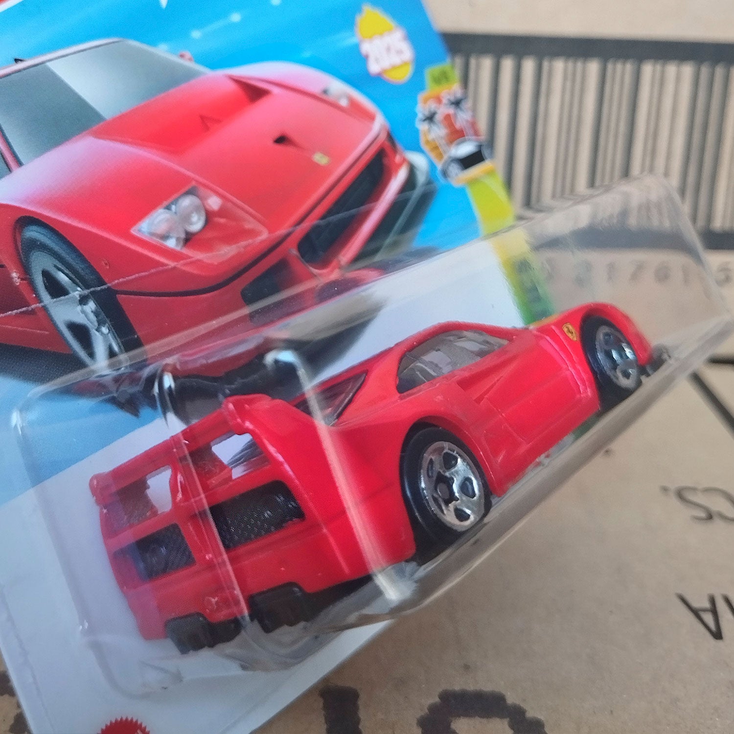 Hot Wheels Ferrari F40 Competizione diecast 1/64 model car in original packaging rear side view