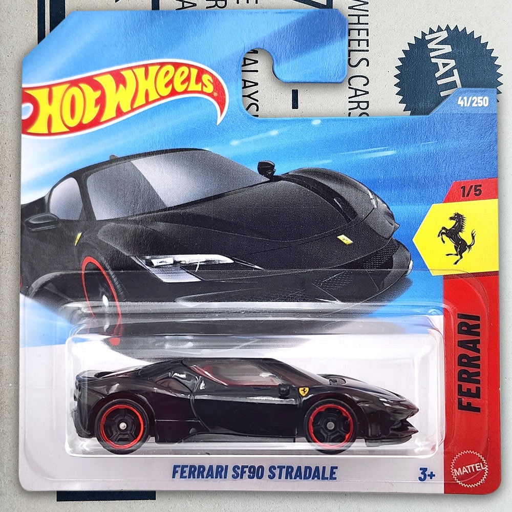 Hot Wheels Mattel Ferrari SF90 Stradale die-cast toy car in its original blister card packaging, featuring a black car with red wheels and a yellow Ferrari logo.