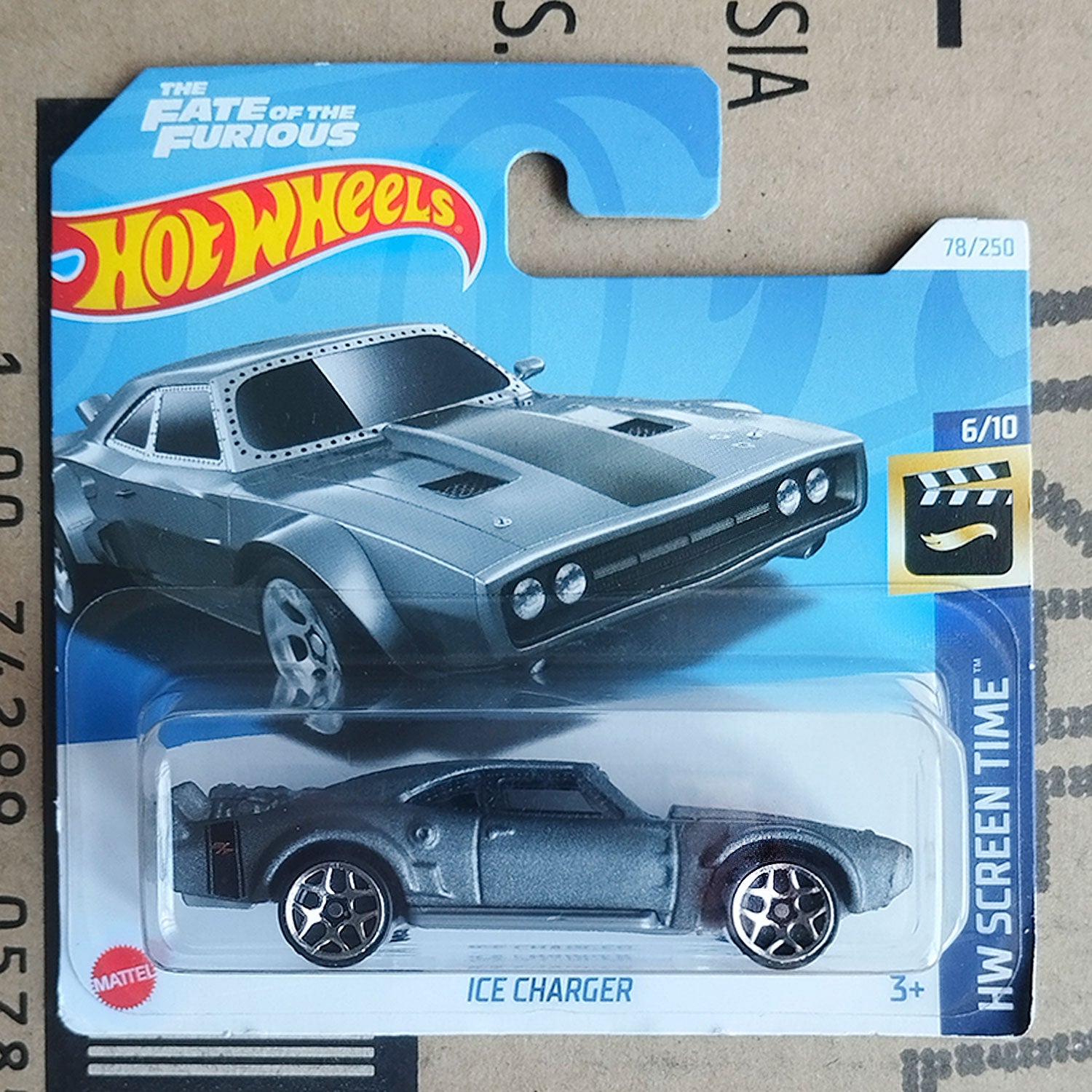 Hot Wheels die-cast toy car in its original blister card packaging, featuring the 'Ice Charger' model from The Fate of the Furious. The packaging has a blue and white design with the iconic Hot Wheels logo.
