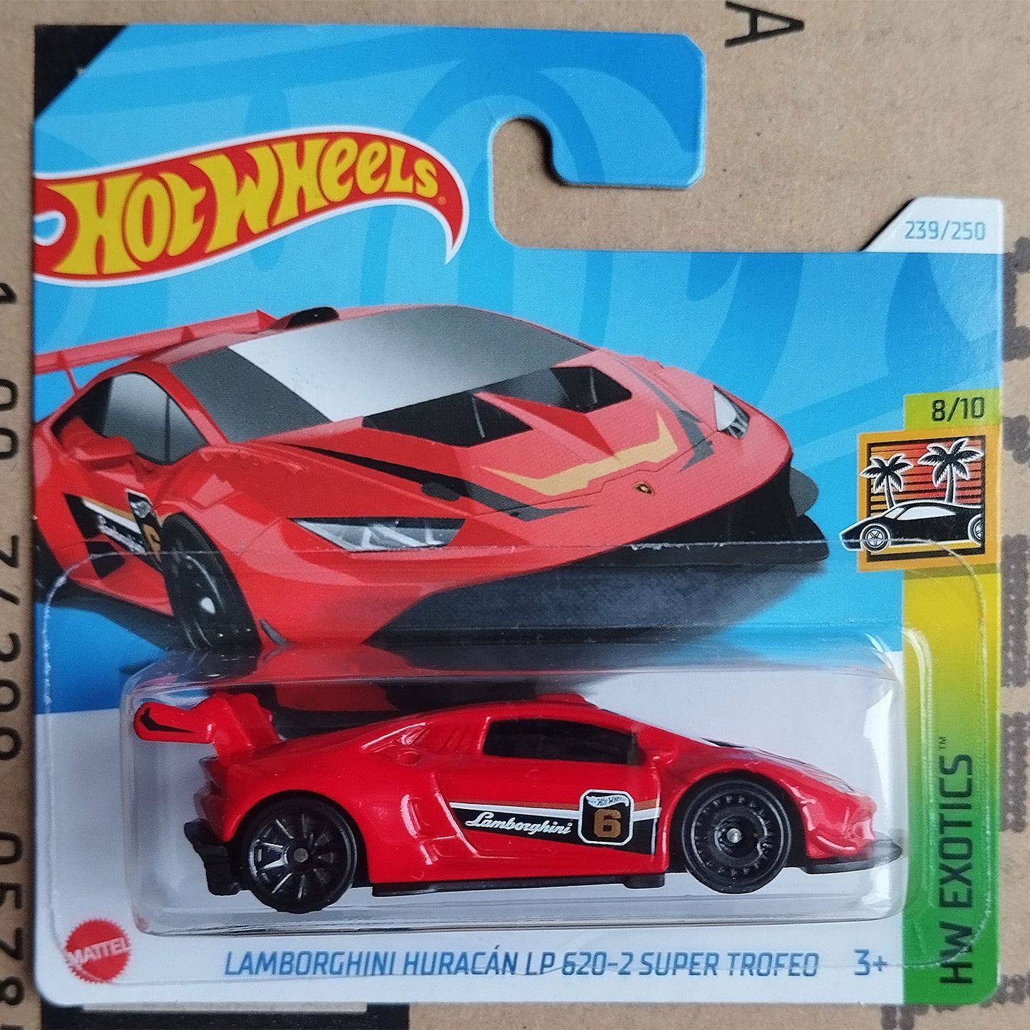 Hot Wheels exotics die-cast toy car of a red Lamborghini Huracan LP 620-2 Super Trofeo, in its original blister pack packaging.