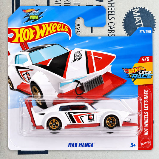 Hot Wheels Mad Manga die-cast toy car in its original Mattel blister packaging, featuring a white, red, and black manga-style race car with gold wheels.