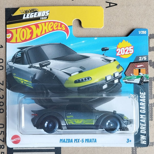 Hot Wheels Legends Toys 2025 Mazda MX-5 Miata die-cast toy car in its original carded packaging, featuring a black and lime green car design.