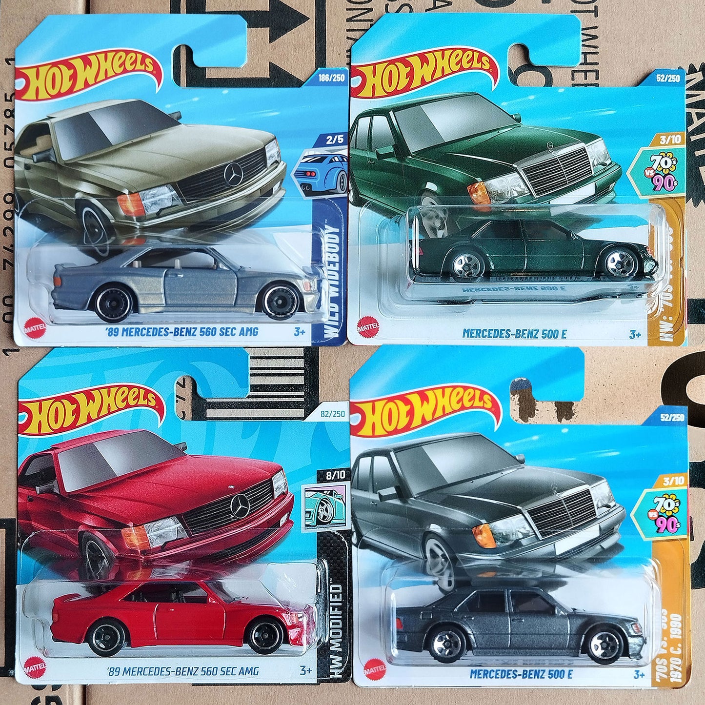 Hot Wheels Mercedes-Benz set of 4 diecast 1/64 cars including 560 SEC AMG and 500E models in original packaging