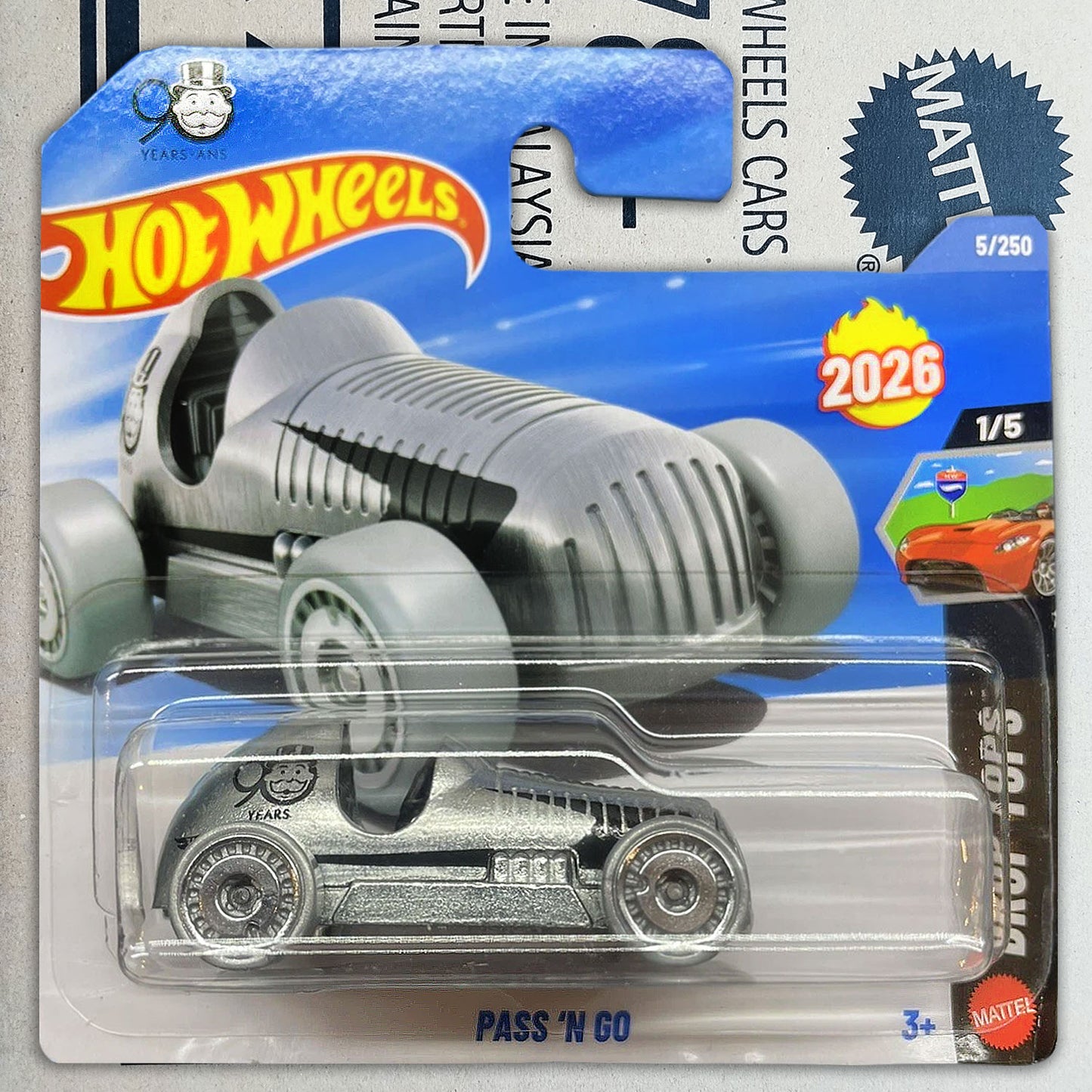 Hot Wheels Monopoly 90 Years Pass’n Go 1/64 diecast collectible car in original packaging