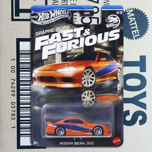 Hot Wheels Silver Series Fast & Furious Nissan Silvia (515) die-cast toy car in its original blister packaging, featuring an orange and blue car design.