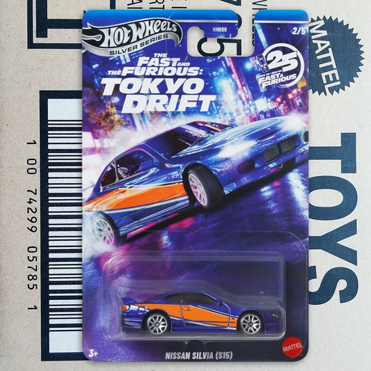Hot Wheels Silver Series die-cast toy car in its original packaging, featuring 'The Fast and Furious: Tokyo Drift' Nissan Silvia. The carded packaging displays a blue and orange striped sports car graphic, with the Hot Wheels logo at the top and a Mattel logo at the bottom.