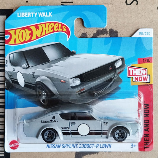 Hot Wheels toy car package featuring a silver Nissan Skyline R32 2000GT-R LBWK die-cast model car in its original blister packaging with a blue cardback.