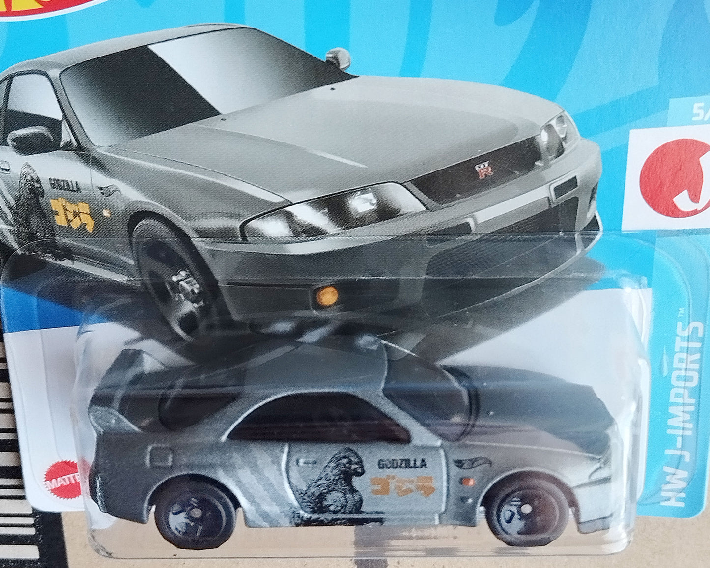 Hot Wheels Nissan Skyline "Godzilla" Diecast JDM Car in packaging close side view