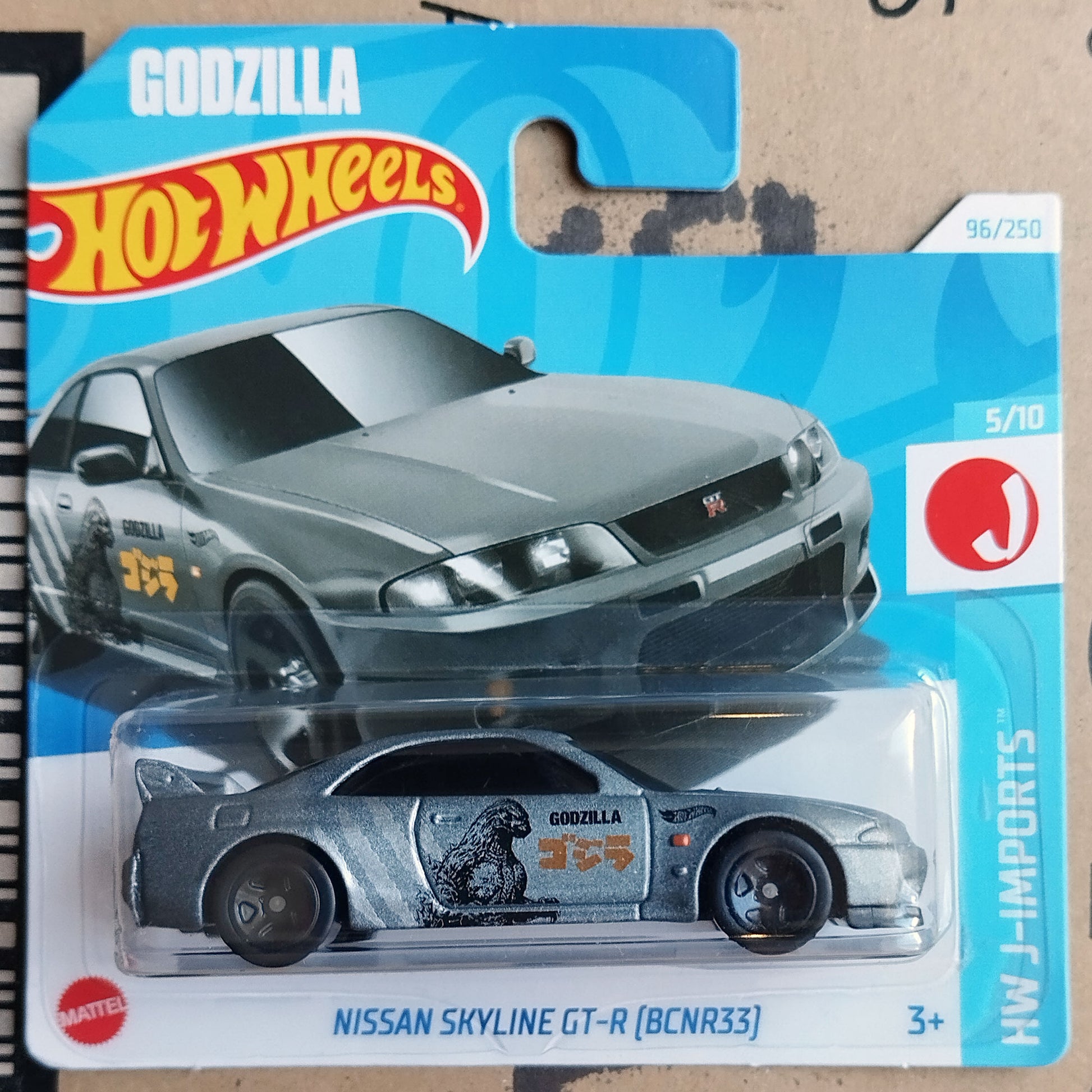 Hot Wheels Godzilla Nissan Skyline GT-R Diecast 1/64 Scale Model in packaging