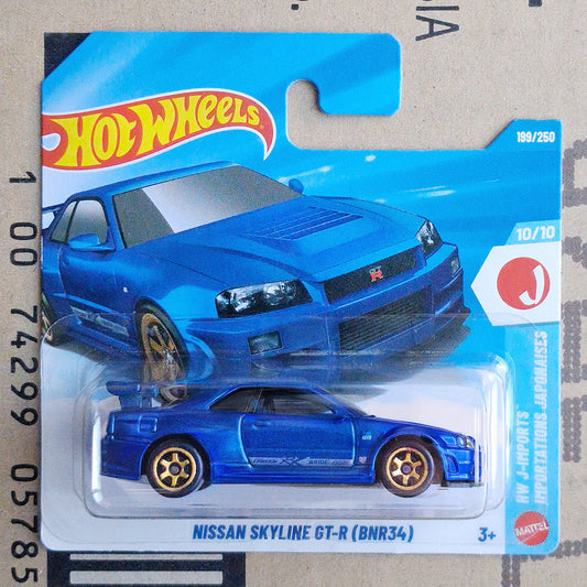 Hot Wheels Mattel Nissan Skyline GT-R toy car in its original blue blister card packaging, featuring the blue car model and a large printed blue car graphic on the card.