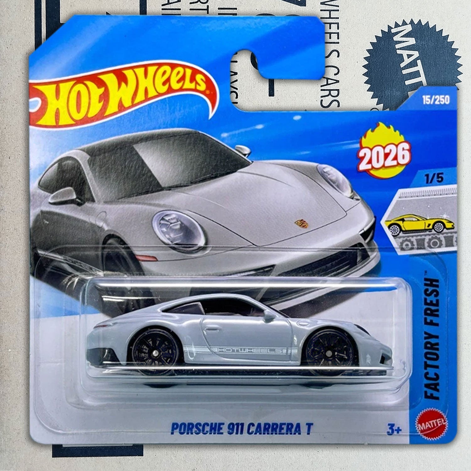 Hot Wheels Mattel 2026 Porsche 911 Carrera T die-cast toy car in its original blister card packaging, featuring a silver car design on a blue and white card.