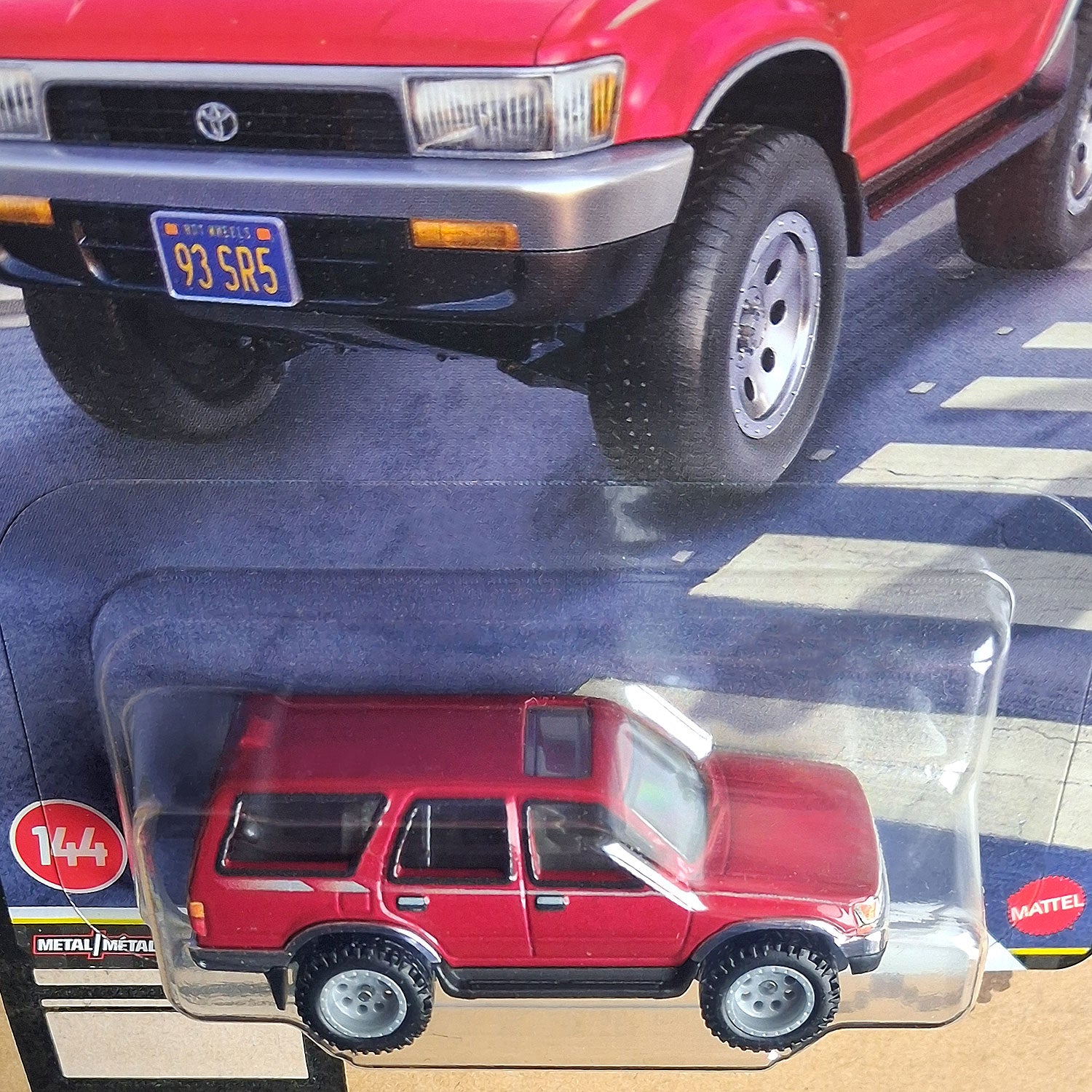 Close-up of Hot Wheels Premium Boulevard 1993 Toyota 4Runner 1/64 diecast SUV with Real Riders tires in sealed packaging