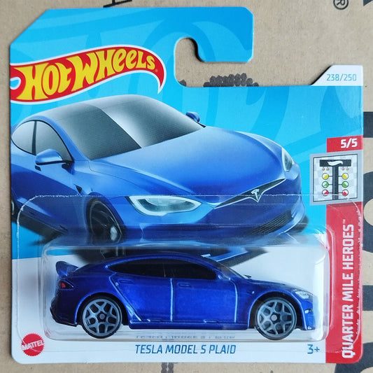 Hot Wheels Mattel Tesla Model S Plaid die-cast toy car in its original blue blister card packaging, featuring the Hot Wheels logo and Mattel branding.