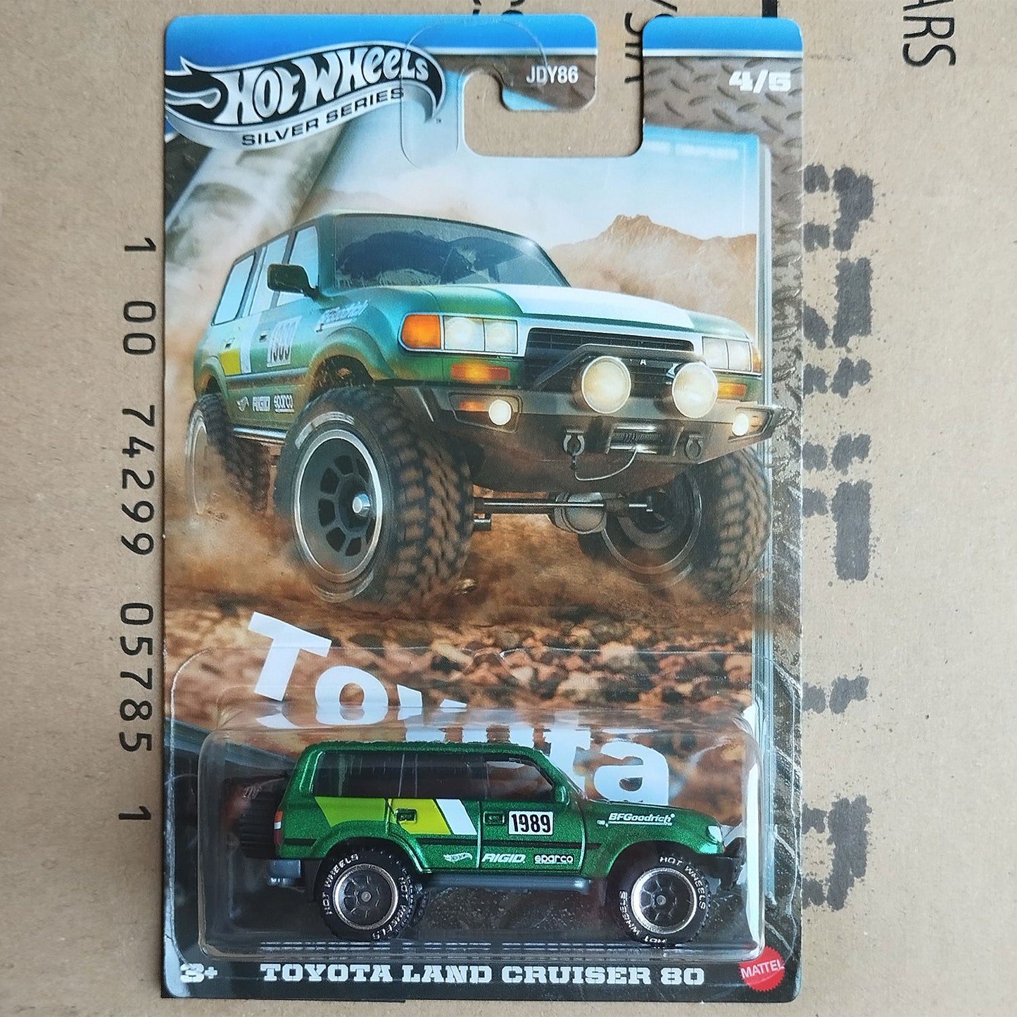 Hot Wheels Toyota Land Cruiser 80 1/64 diecast off-road JDM SUV in Silver Series blister packaging