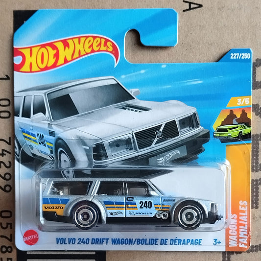 Hot Wheels Mattel Volvo 240 Drift Wagon toy car in its original blister card packaging, featuring a silver car with blue and yellow racing decals.