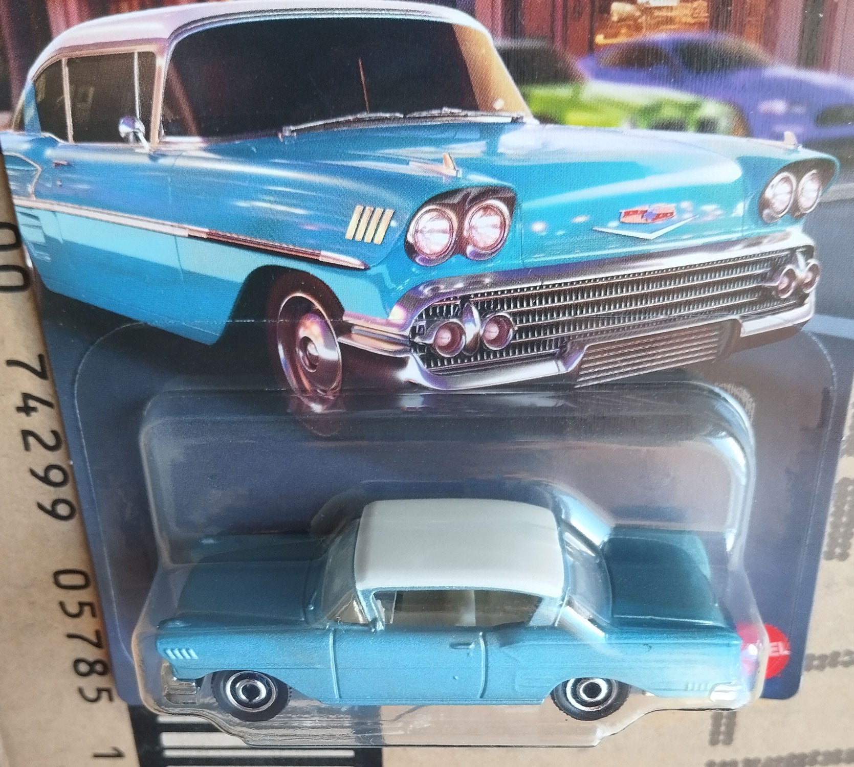 Matchbox 1958 Chevrolet Impala Diecast 1/64 Scale Model Car in the blister - close side view