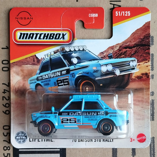 Matchbox die-cast toy car of the Nissan Datsun 210 Rally car, number 25, in its original blister pack card. The toy car is light blue with black and white racing decals.