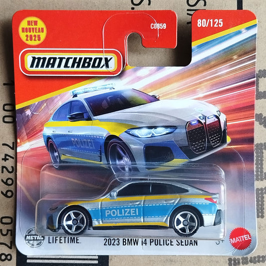 Matchbox Mattel 2023 BMW i4 Police Sedan die-cast toy car in its original blister card packaging, featuring a silver car with blue and yellow police markings.