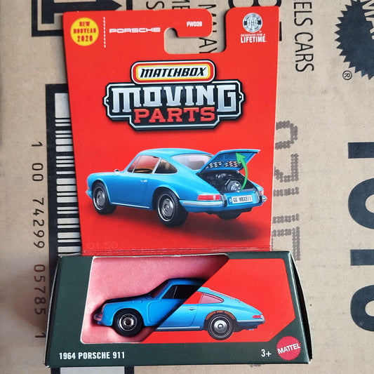 A Matchbox Moving Parts die-cast toy car of a 1964 Porsche 911, shown in its red retail blister packaging and its separate dark green base box. The toy car is blue with black and silver details.