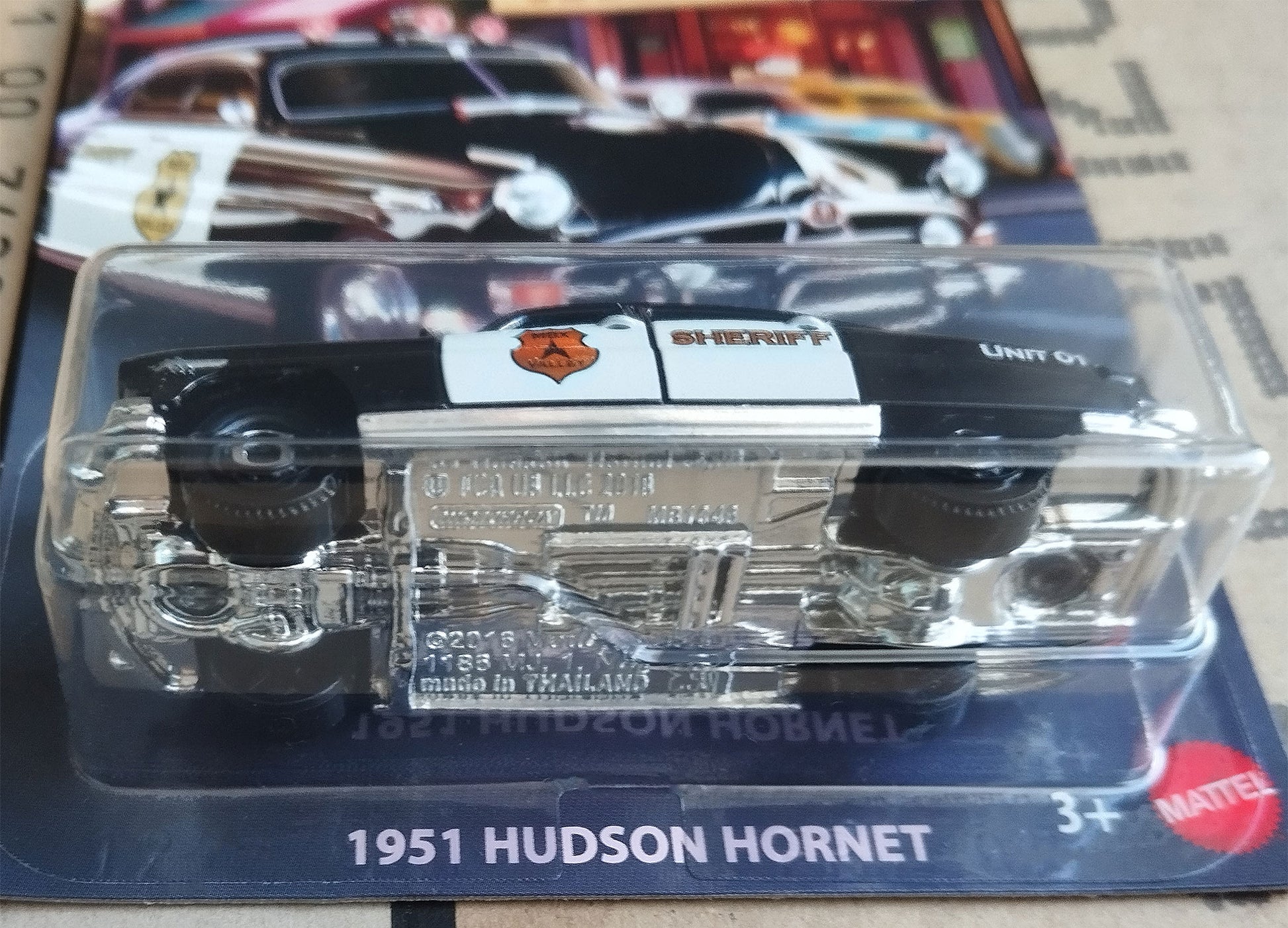 Matchbox Police Car 1951 Hudson Hornet Sheriff Diecast 1/64  Scale Model in packaging - close bottom view