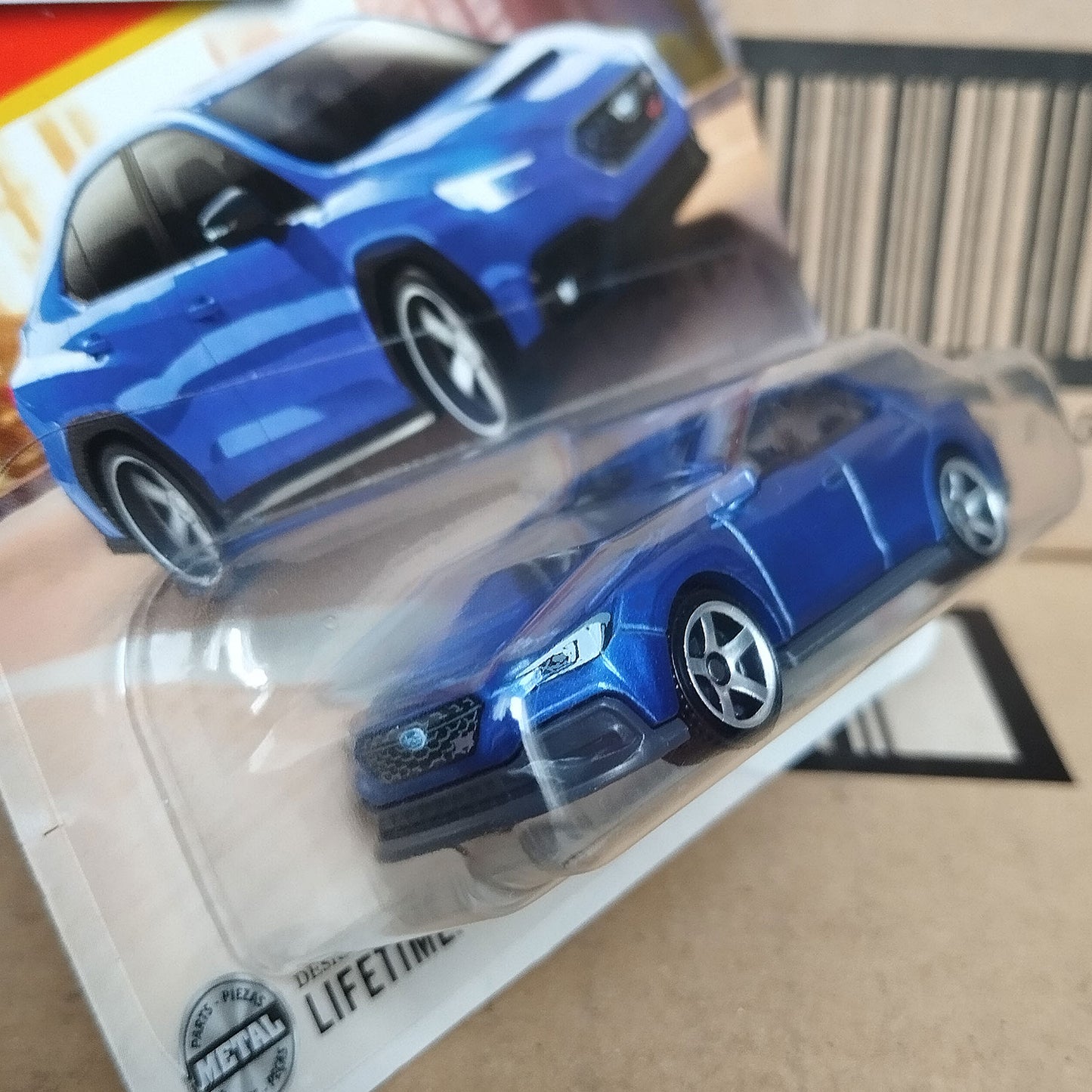 Matchbox 2024 Subaru WRX S4 STI diecast 1/64 blue car angled close-up view in original packaging