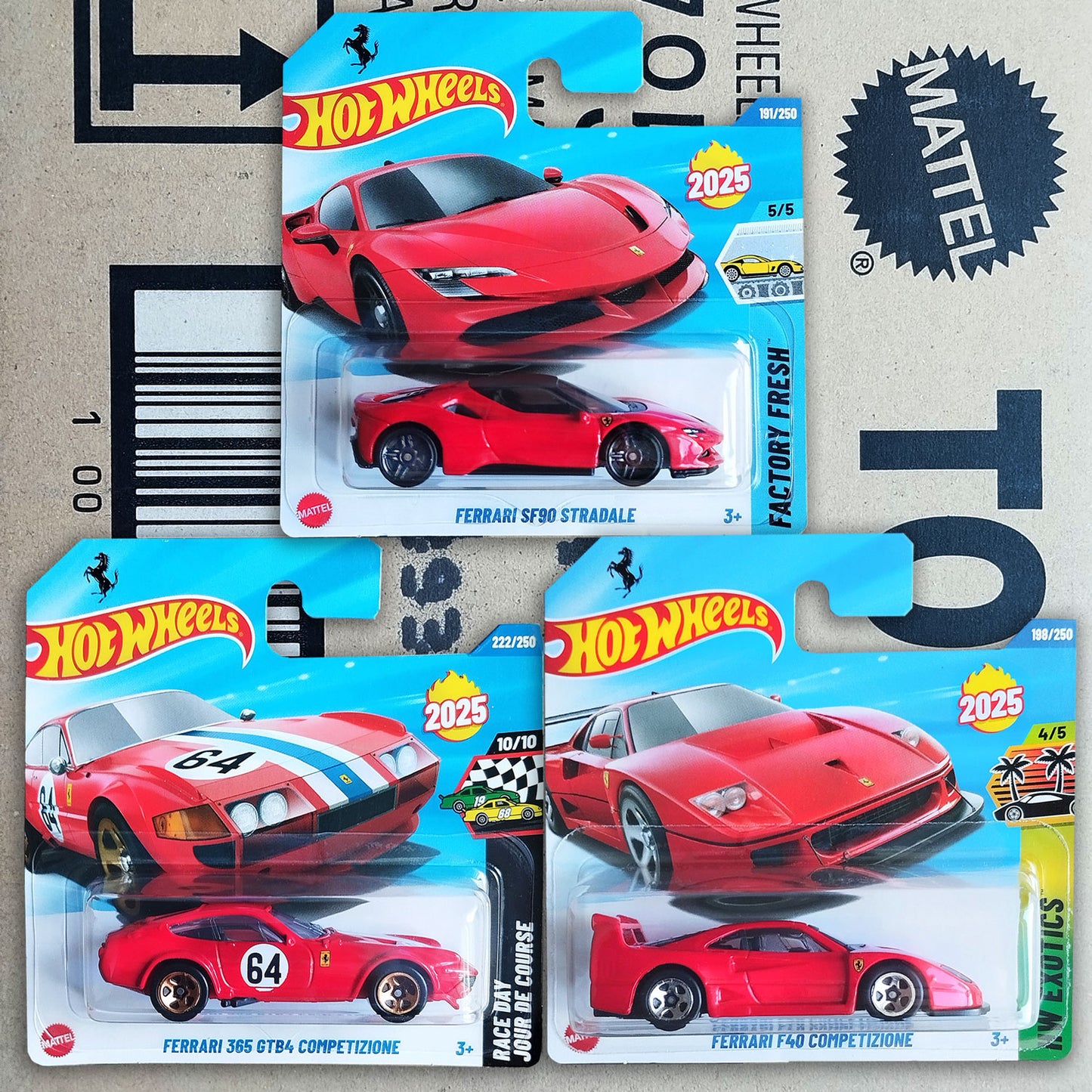 Three Hot Wheels Ferrari Diecast 1/64 Scale Models in packaging